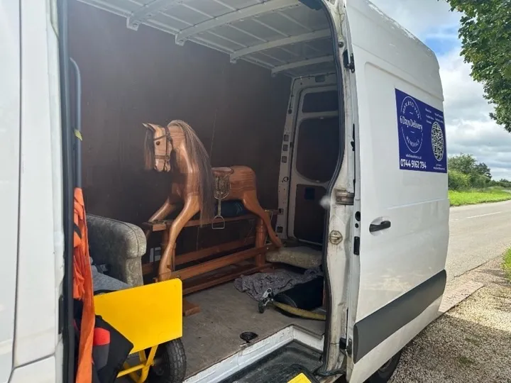 Specialist furniture delivery Specialist furniture delivery — ornate wooden rocking horse loaded safely in a man and van removals vehicle