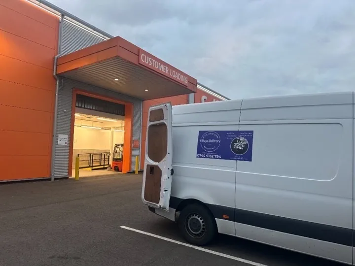 Storage solutions — customer loading bay Removals van at a storage facility customer loading bay with rear doors open, ready for collection and redelivery